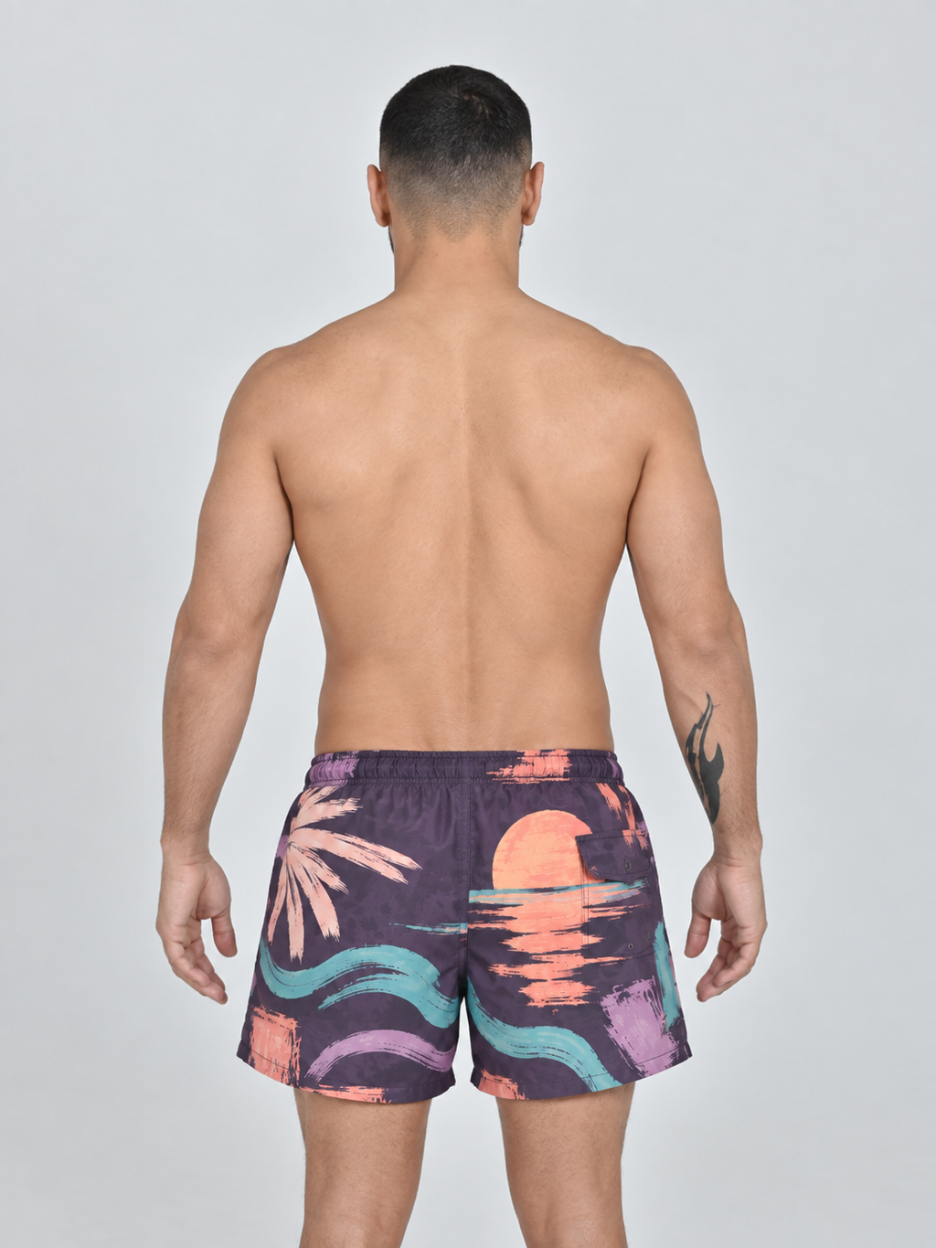 Back view of Buen Nado men's Gordon Sunset swim shorts